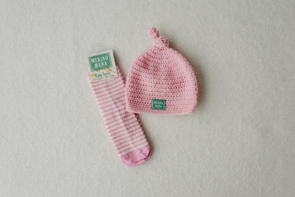 pink merino wool baby beanie and socks set made in new zealand